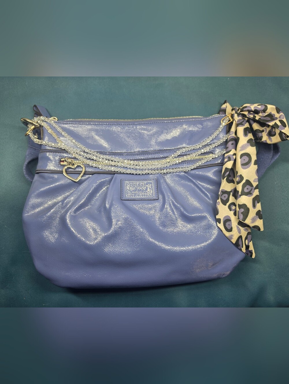 Coach Periwinkle/ Lavender Blue Patent Leather Crossbody Bag with Heart Charm